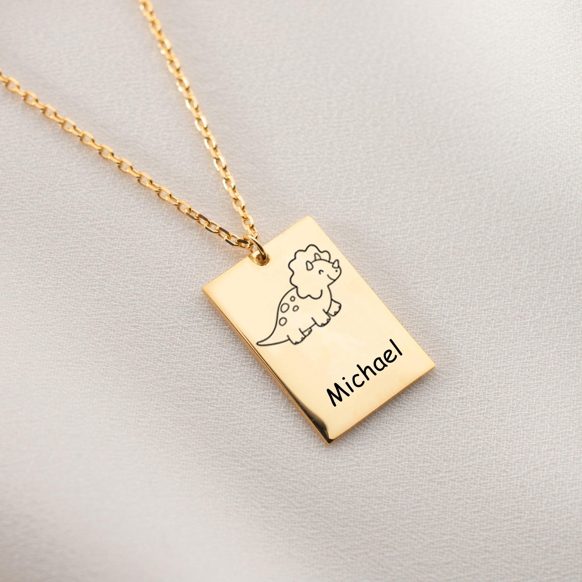 Custom baby dinosaur necklace, a personalized and playful jewelry piece perfect for dinosaur lovers.