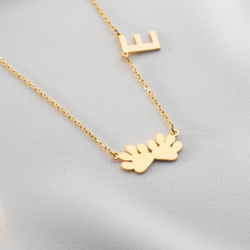 Personalized paw letter necklace, a unique and meaningful jewelry piece designed to celebrate your love for pets