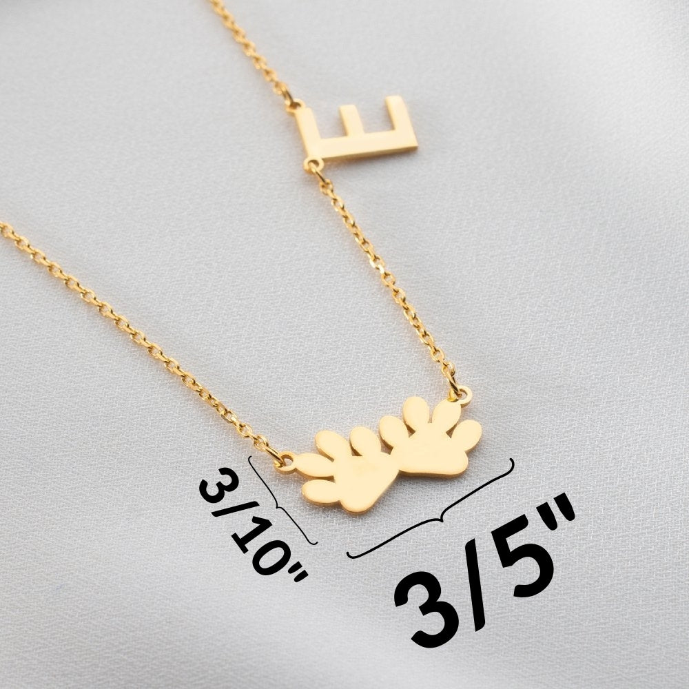 Gold-plated paw initial necklace, a personalized and elegant jewelry piece featuring a custom paw design and initial, perfect for dog lovers