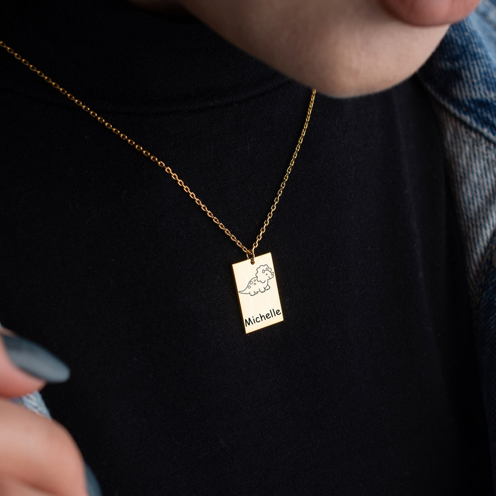 Personalized cute name dino jewelry, a fun and unique accessory featuring a custom dinosaur design.