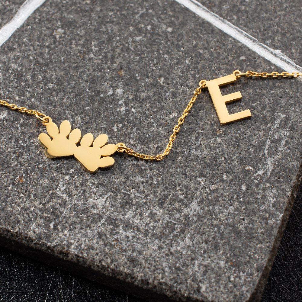 Personalized dog paw letter necklace, a special and meaningful jewelry piece celebrating your love for dogs with a custom paw design