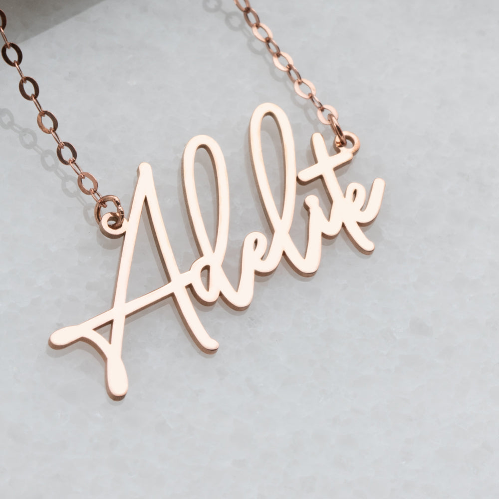 Personalized rose gold name necklace, custom-crafted for a unique and elegant touch, perfect for special occasions or everyday wear.