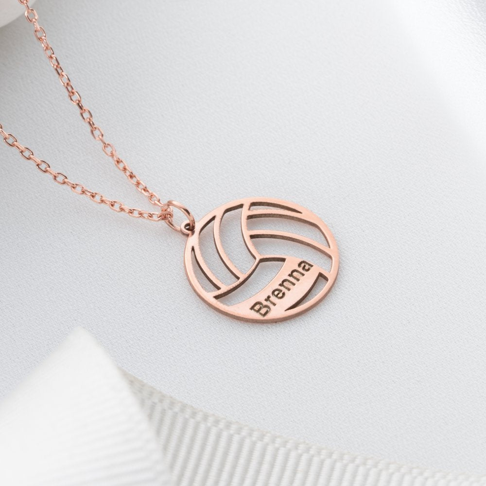 Rose gold volleyball name necklace, a chic and personalized sports jewelry piece.