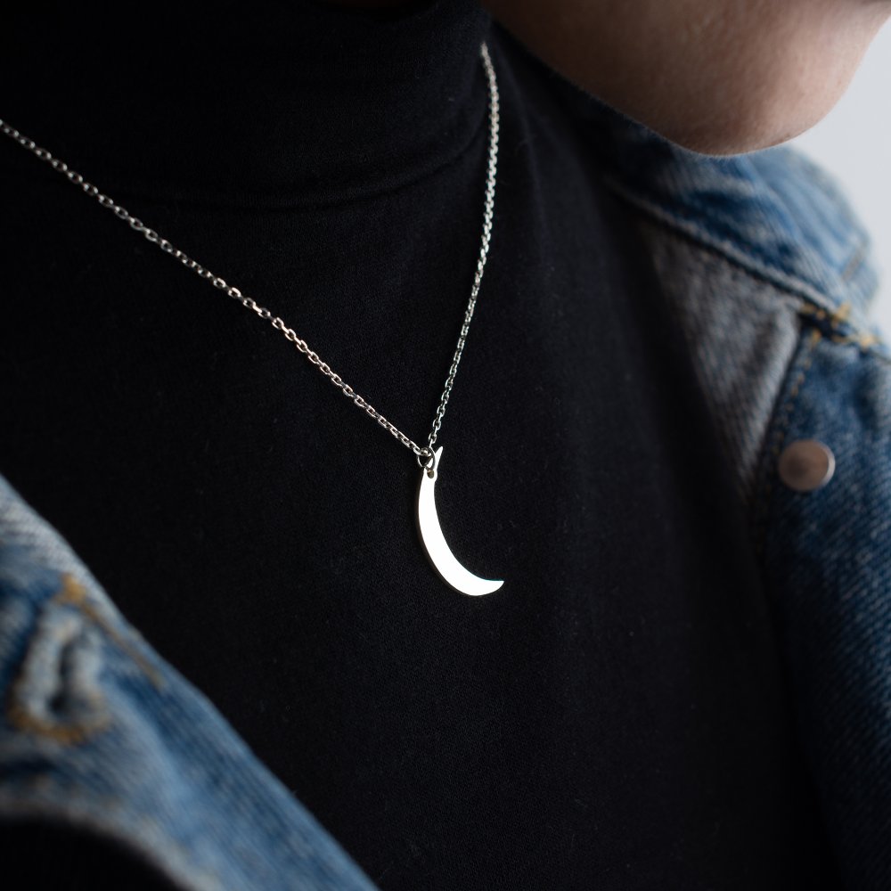 Handcrafted crescent moon necklace in gold or silver, stylish and timeless celestial design.