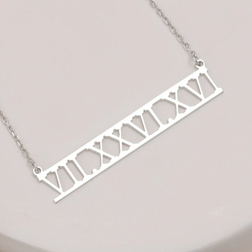 Custom date necklace with Roman numeral pendant, elegant and personalized.