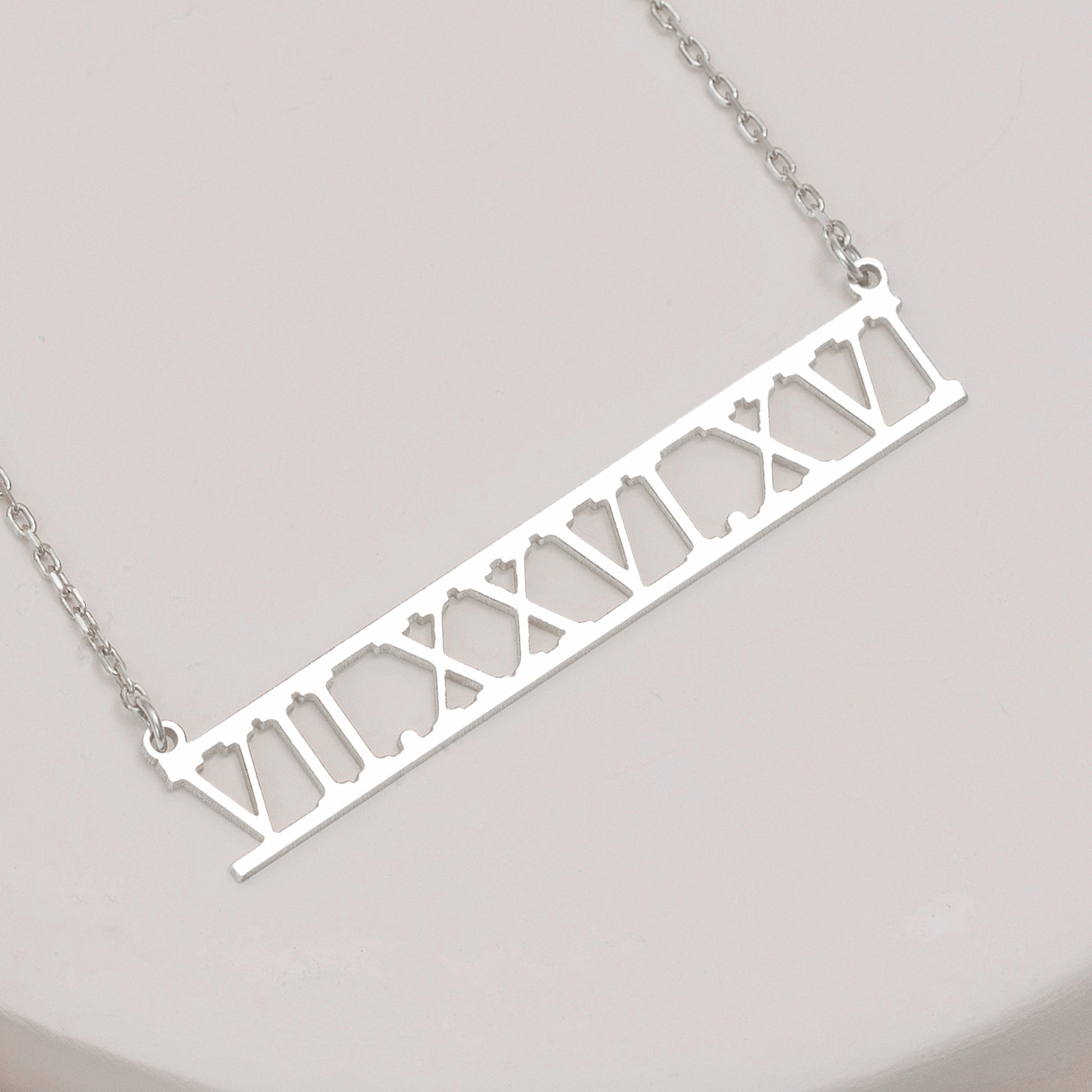 Custom date necklace with Roman numeral pendant, elegant and personalized.