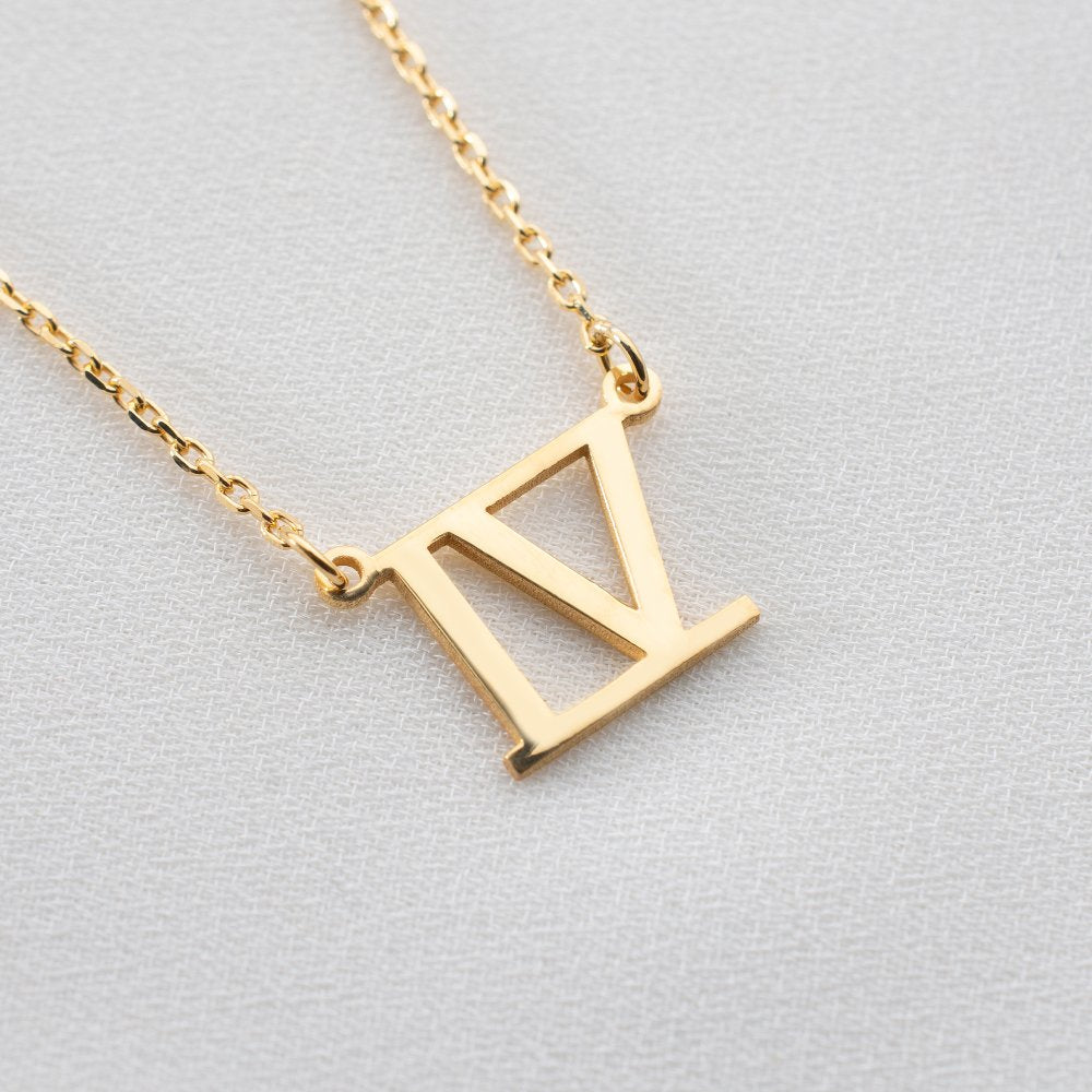 Custom date pendant with Roman numerals, engraved to commemorate life’s most cherished moments