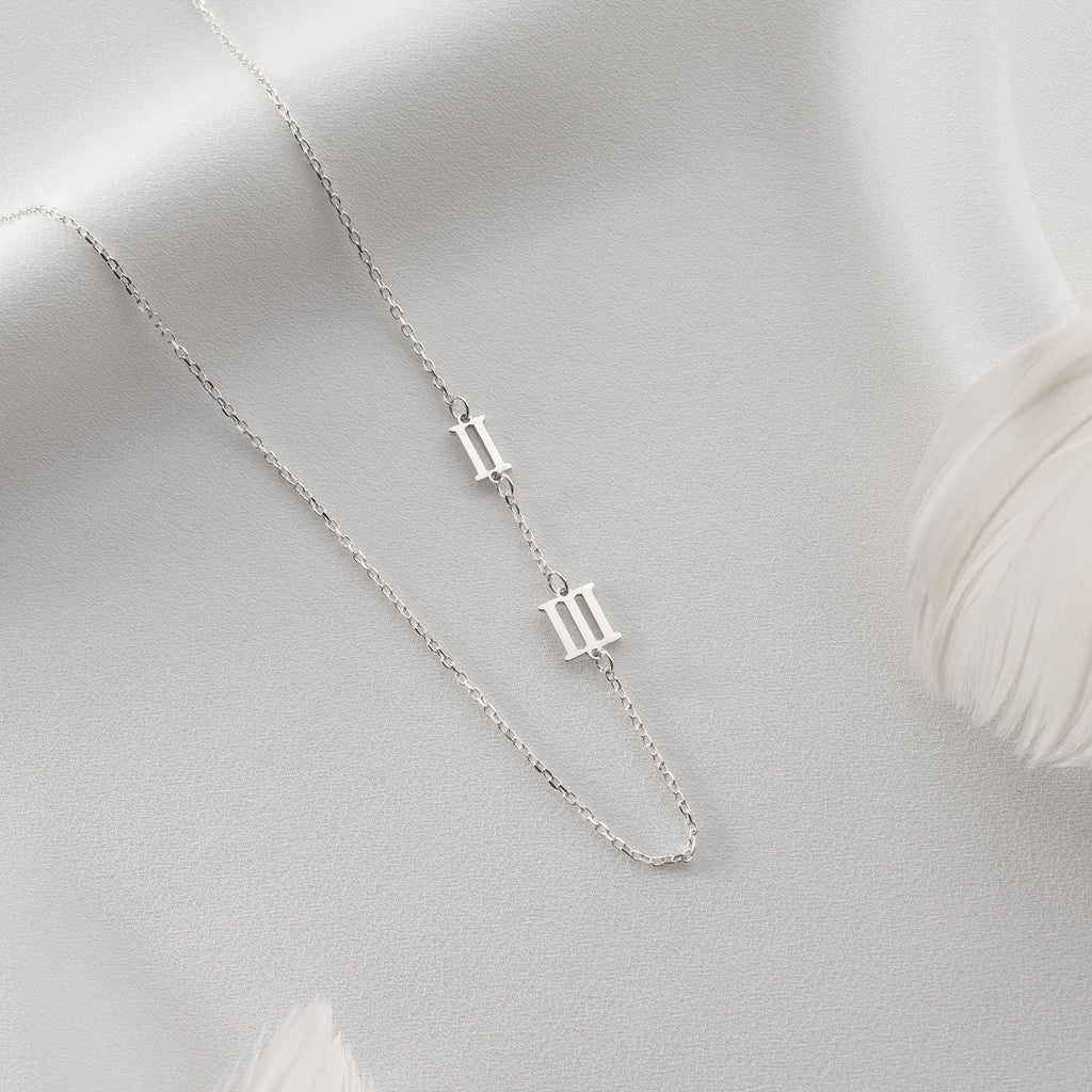 Custom Roman numeral date necklace, a timeless personalized accessory.