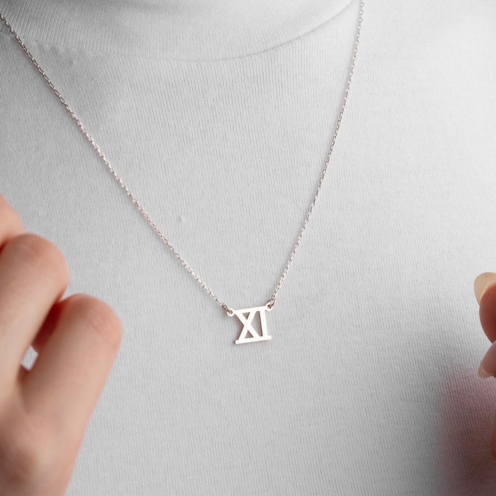 Custom Roman numeral necklace, a meaningful and personal gift to celebrate important moments.