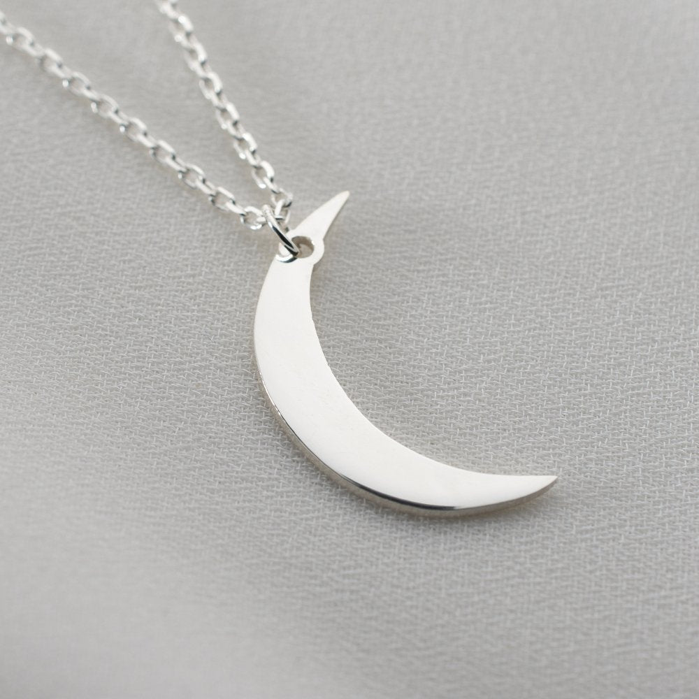 Dainty crescent moon necklace for women, a delicate celestial pendant perfect for everyday wear