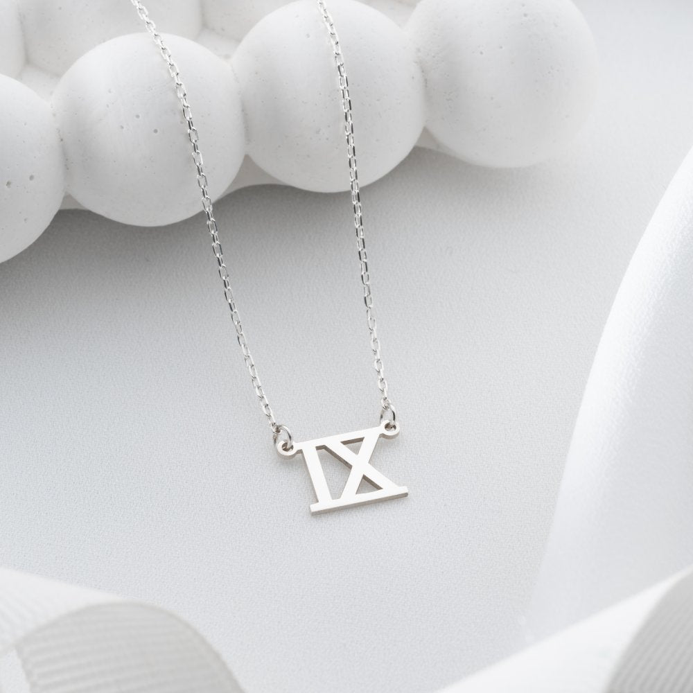 Engraved year date necklace, perfect for commemorating a special event with custom design.