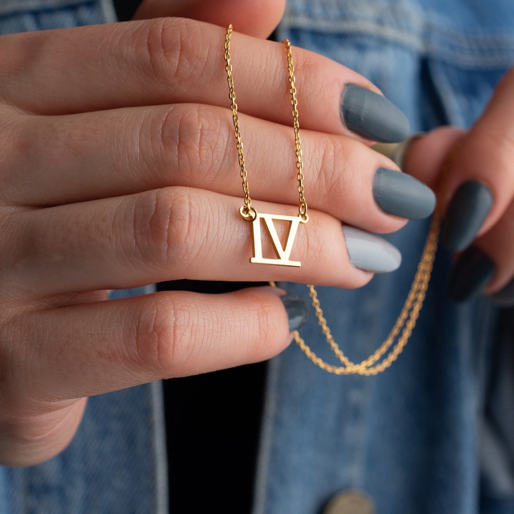 Meaningful date necklace featuring Roman numerals, a timeless keepsake for special occasions.