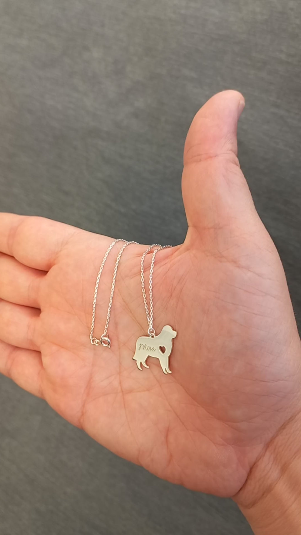 Custom engraved dog jewelry, a personalized keepsake for dog owners and pet lovers.
