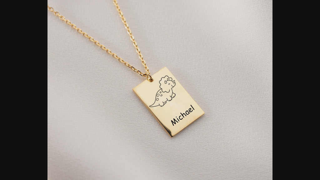 Baby dino necklace, a unique and playful graduation gift, perfect for celebrating achievements with a touch of charm.