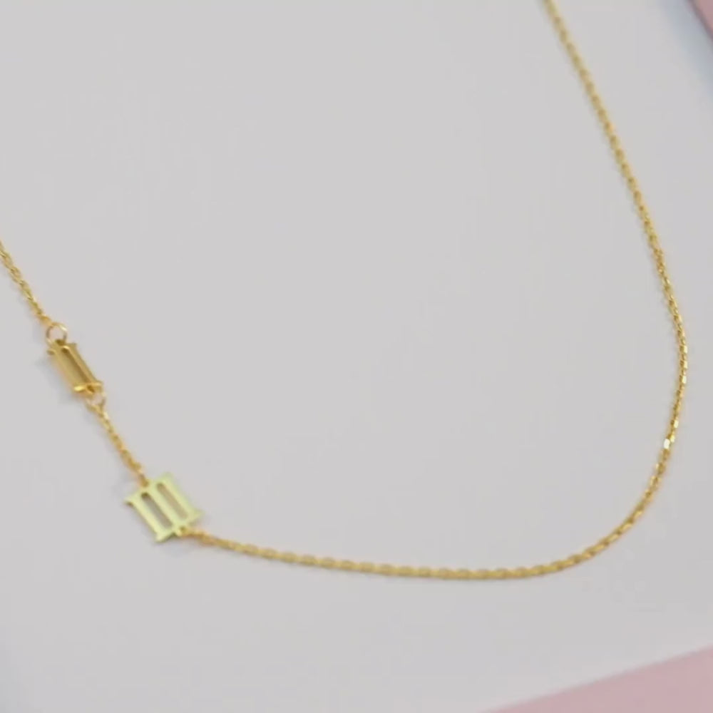 Engraved number necklace representing a special date or year in a dainty style.