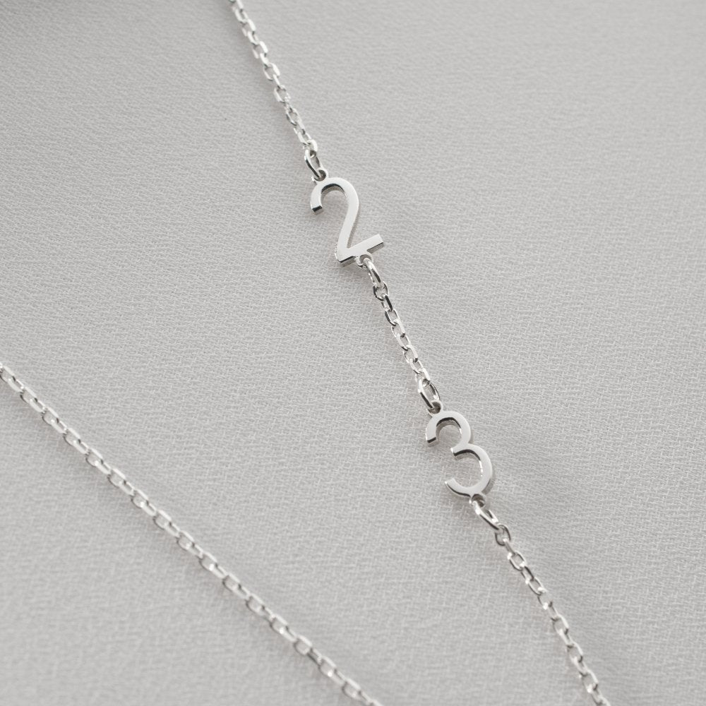 Minimalist sterling silver side number necklace, elegant and timeless.